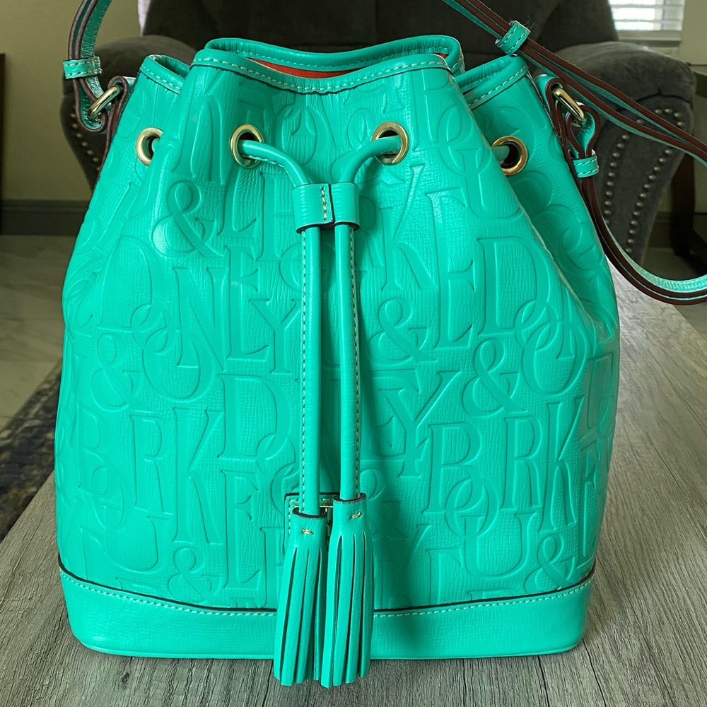 SOLD!!! Dooney & Bourke Aqua Retro Embossed Drawst